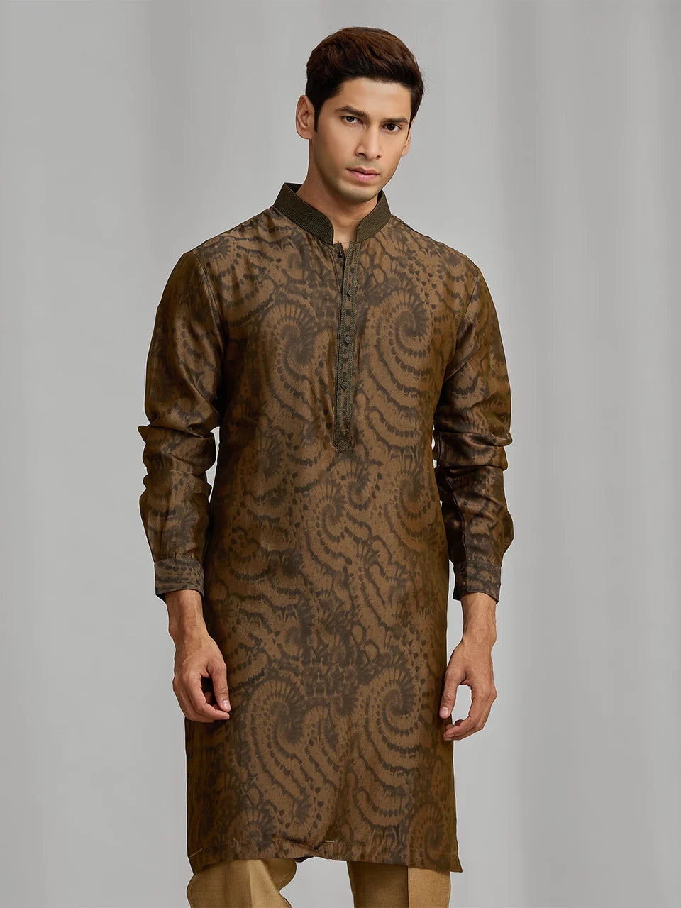 Olive silk-blend kurta with rhythmic print, paired with antique gold Aligarhi pants.
