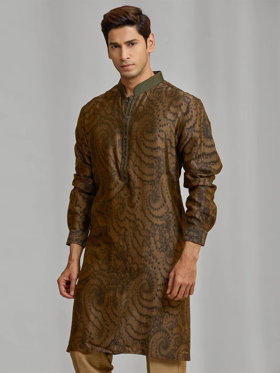 Olive silk-blend kurta with rhythmic print, paired with antique gold Aligarhi pants.